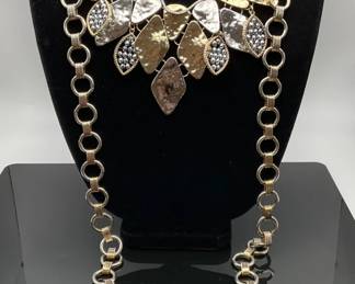 16" gold necklace, stamped "JCM 10K", with amethyst beads. 4.82 gtw. Also includes (3) fashion necklaces: (2) gold tone and silver tone chunky necklaces and (1) silver tone box chain.
