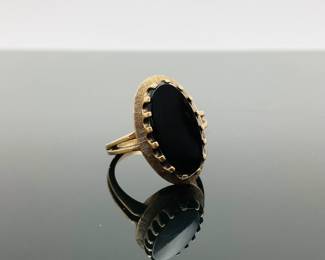 Black Onyx 10K gold size 6 ring. Stamped "10K". 4.08 gtw.