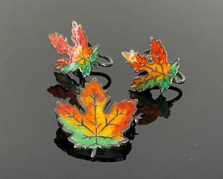 Sterling silver maple leaf pin and screw back clip earrings, featuring fall colored enamel. 6.59 gtw.