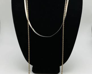 Two (2) silver tone necklaces and (3) mixed metal bracelets.