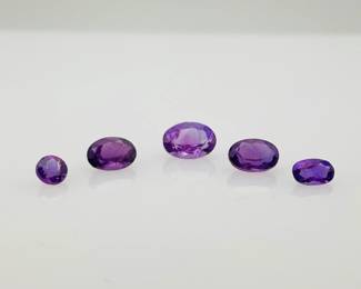 Five (5) purple tourmaline gemstones. Assorted sizes and shapes. 2.10 ctw.