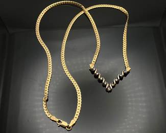 17" 10K gold Cuban chain with diamonds arranged in a V at the center. Stamped "ADL 417 Italy". 5.77 gtw.