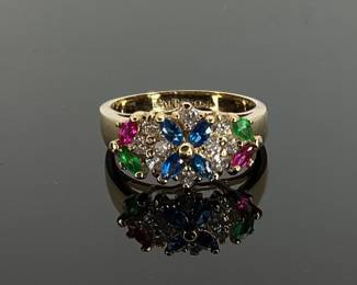 Multiple colored gemstones make this gold plated over silver ring sparkle. Size 9. 5.08 gtw.