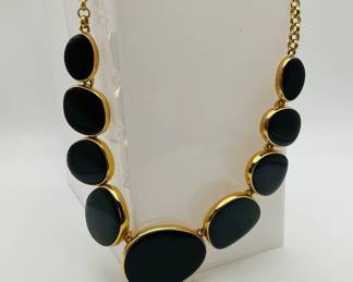Kenneth Jay Lane black enamel gold tone necklace.