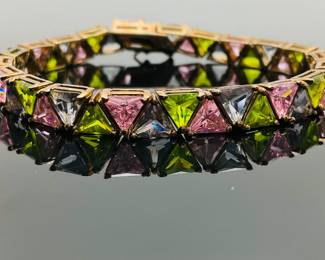 Rhinestone tennis bracelet set in sterling silver (stamped 925).