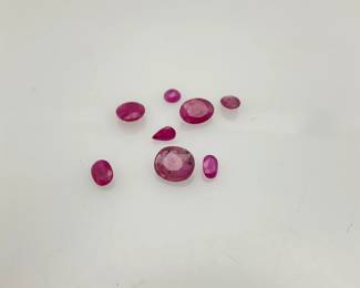 Eight (8) pink topaz gemstones. Variety of sizes and cuts. 5.40 ctw.