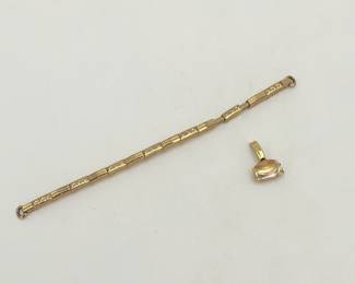 5" gold link bracelet on an elastic band, broken clasp, no markings, but tests as 10K. Partial clasp, possibly from a watch, tests as 18K. 8 gtw.