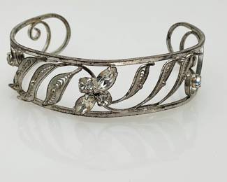 Sterling silver cuff bracelet, approximately 5". Leaf and flower design with rhinestones. 14.66 gtw.