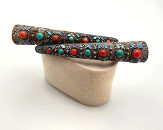 Two (2) Chinese silver fingernail guard pins accented with stones of turquoise and coral. 29.35 gtw.