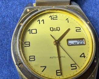 Q AND Q BY CITIZEN, AUTOMATIC DAY/ DATE WATCH. 