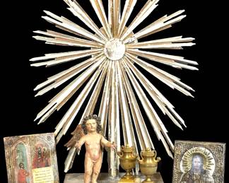 Chippy Painted Sunburst on Stand with Icons, Wooden Putti, and Small Bronze Urns