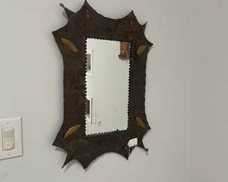 K15 - $20. Mexican Tin Framed Mirror. Measures 17" wide x 23" tall. Does have some rust spots on the frame that are visible. 