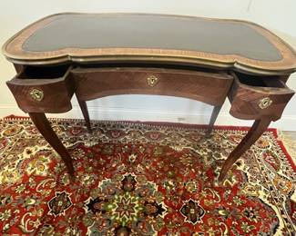 M3 - $275. Antique Leather Top Writing Desk or Vanity. Measures 35.35" wide x 17.5" deep x 28.5" tall. Has 3 drawers that would lock (no key!) Veneer is in good condition overall but does have a few missing pieces here and there. 