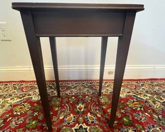 M14 - $40. Childs size Mahogany Leather Top Side Table. Measures 10" wide x 14" deep x 19" tall. 