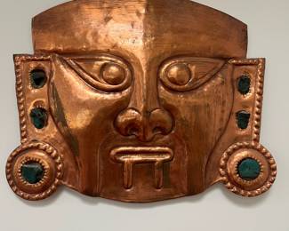 K41 - $65. Copper Funerary Mask from Peru with Malachite accents. Measures 14" wide x 12" tall. 