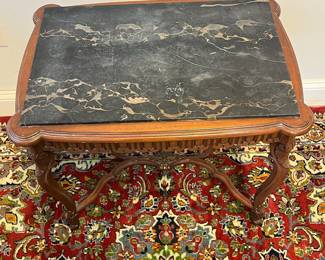 M25 - $75. Antique Marble Top Side Table. Measures 25" wide x 16.75" deep x 23.5" tall. Table is sturdy but has a little wiggle to it. 