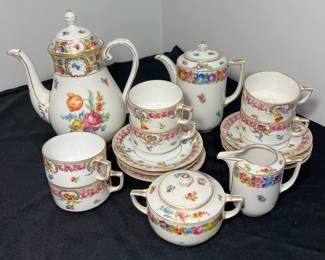 M60 - $150. Schumann Bavaria Empress Dresden Flowers Hand Painted. 1 coffee pot. 1 tea pot. 1 cream & sugar. 6 Tea cups. 6 saucers. 15 pieces. All appear to be in very good vintage/ antique condition!