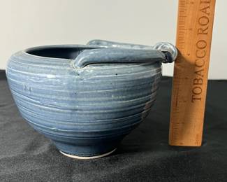 M56 - $20 Pottery Bowl. Measures 6.75" wide x 4.75" tall. 