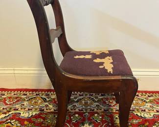 M13 - $50. Childs, Antique Mahogany, Carved Rose Chair with needlepoint seat. Sturdy and in very good condition. Measures 11.5" wide x 12" deep x 22" tall. 