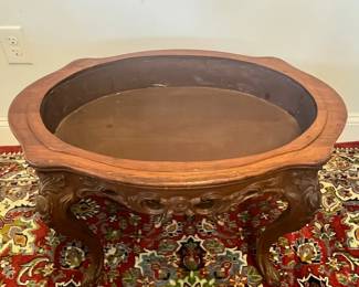 M8 - $200. Carved Wood Display Table with Removable glass Top. Measures 32" x 22" x 21" tall. 