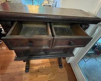 M105 - $650. Antique Renaissance Style Carved Walnut (?) 2 piece cabinet. Top & Base Move separately. Measures 38.5" x 15" deep x 46" tall. Hardware is all handmade - primitive. 
