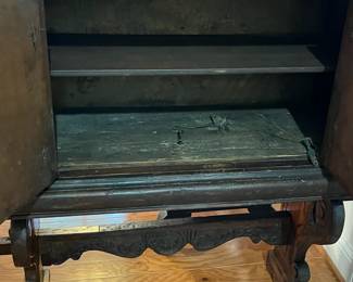 M105 - $650. Antique Renaissance Style Carved Walnut (?) 2 piece cabinet. Top & Base Move separately. Measures 38.5" x 15" deep x 46" tall. Hardware is all handmade - primitive. 