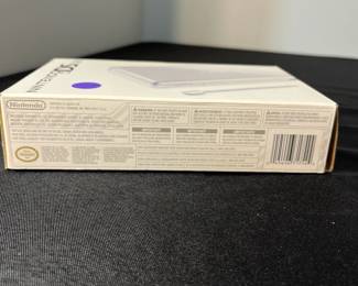 M133 - $60. Nintendo DS lite. Looks like its never been out of the box. 