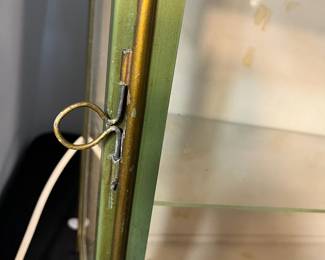 M135 - $100. Hand Painted Chinoiserie Metal/Tin Toleware "Pagoda Cabinet". Lighted Display Cabinet with Glass Shelves. Made in France. Was wall mounted but I believe it can also be hung. Measures 21.25" wide x 7.25" deep x 22" tall. 