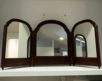 M110 - $125. Hand Painted Antique Tri-Fold Mirror. Center Mirror moves. Measures 54" x 28.5". Middle is 22.5" Each End is 16". 