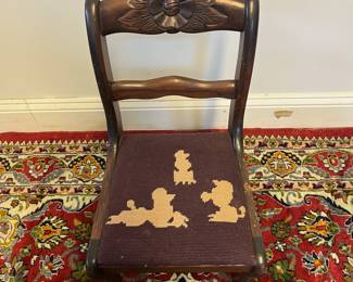 M13 - $50. Childs, Antique Mahogany, Carved Rose Chair with needlepoint seat. Sturdy and in very good condition. Measures 11.5" wide x 12" deep x 22" tall. 