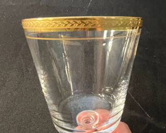 M90 - $30. Tiffin Glasses 6" tall. 9 pieces included. All have wear on gold trim. 