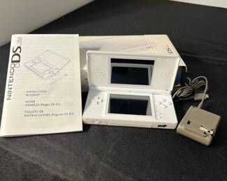 M133 - $60. Nintendo DS lite. Looks like its never been out of the box. 