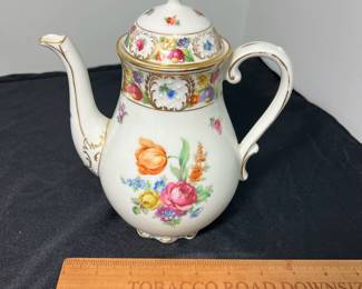M60 - $150. Schumann Bavaria Empress Dresden Flowers Hand Painted. 1 coffee pot. 1 tea pot. 1 cream & sugar. 6 Tea cups. 6 saucers. 15 pieces. All appear to be in very good vintage/ antique condition!
