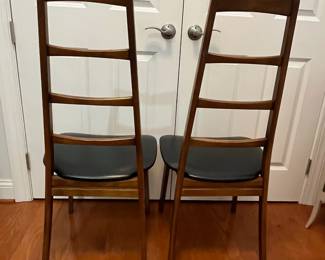 K81 - $150 PAIR MCM Ladder Back Chairs. Measures 18" wide x 17" deep x 41" tall. Both are structurally sturdy and in very good vintage condition!