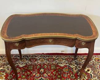 M3 - $275. Antique Leather Top Writing Desk or Vanity. Measures 35.35" wide x 17.5" deep x 28.5" tall. Has 3 drawers that would lock (no key!) Veneer is in good condition overall but does have a few missing pieces here and there. 