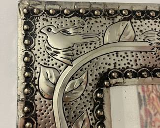 K20 - $50. Mexican Folk Art Punched Tin Mirror. Measures 17" x 21". 