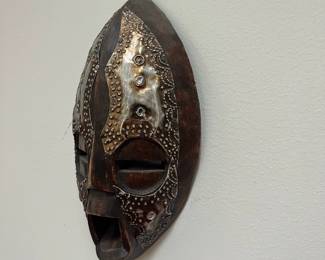 K42 - $30. Vintage African Akan Folk Art Ebonized Metal & Wood Mask.  Measures 5.25" wide x 9.75" tall. 
