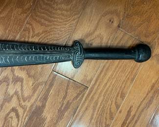 K49 - $30. Decorative Papau New Guinea Sword. 24.75" long. 