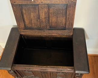 M138 - $275. Gothic Revival Small Chest with Carved Knight Figures. Measures 24.5" wide x 15" deep x 18" tall. 
