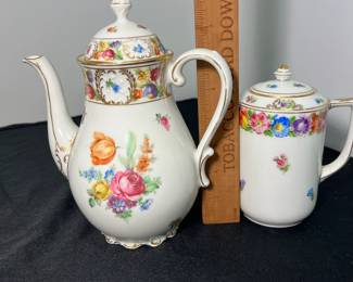 M60 - $150. Schumann Bavaria Empress Dresden Flowers Hand Painted. 1 coffee pot. 1 tea pot. 1 cream & sugar. 6 Tea cups. 6 saucers. 15 pieces. All appear to be in very good vintage/ antique condition!