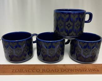 K57 - $65. 1970s Hornsea England Heirloom Midnight Blue. 4 plates (1 has a chip) 4 cups. 