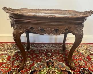 M8 - $200. Carved Wood Display Table with Removable glass Top. Measures 32" x 22" x 21" tall. 