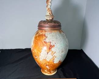 M54 - $85. Signed Bob "Hasselle" Raku Pottery Urn. Measures 9" wide x 18.5" tall. 