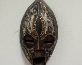 K42 - $30. Vintage African Akan Folk Art Ebonized Metal & Wood Mask.  Measures 5.25" wide x 9.75" tall. 
