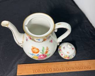 M60 - $150. Schumann Bavaria Empress Dresden Flowers Hand Painted. 1 coffee pot. 1 tea pot. 1 cream & sugar. 6 Tea cups. 6 saucers. 15 pieces. All appear to be in very good vintage/ antique condition!