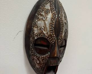 K42 - $30. Vintage African Akan Folk Art Ebonized Metal & Wood Mask.  Measures 5.25" wide x 9.75" tall. 