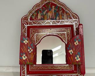 K9 - $30. Moroccan Wall Mirror with Doors. Measures 9" wide x 12.5" tall. 