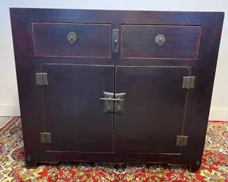 M48 - $450. Two Door, Two Drawer Red Asian Chest. Measures 41" wide x 25.5" deep x 35.75" tall. 