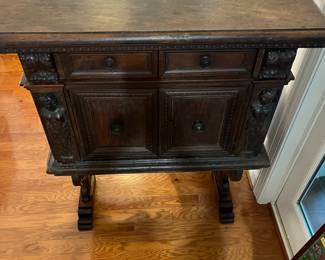 M105 - $650. Antique Renaissance Style Carved Walnut (?) 2 piece cabinet. Top & Base Move separately. Measures 38.5" x 15" deep x 46" tall. Hardware is all handmade - primitive. 