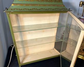 M135 - $100. Hand Painted Chinoiserie Metal/Tin Toleware "Pagoda Cabinet". Lighted Display Cabinet with Glass Shelves. Made in France. Was wall mounted but I believe it can also be hung. Measures 21.25" wide x 7.25" deep x 22" tall. 